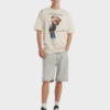 Camiseta overzise beige ilustración