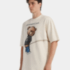Camiseta overzise beige ilustración