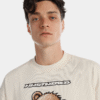 Camiseta overzise beige ilustración
