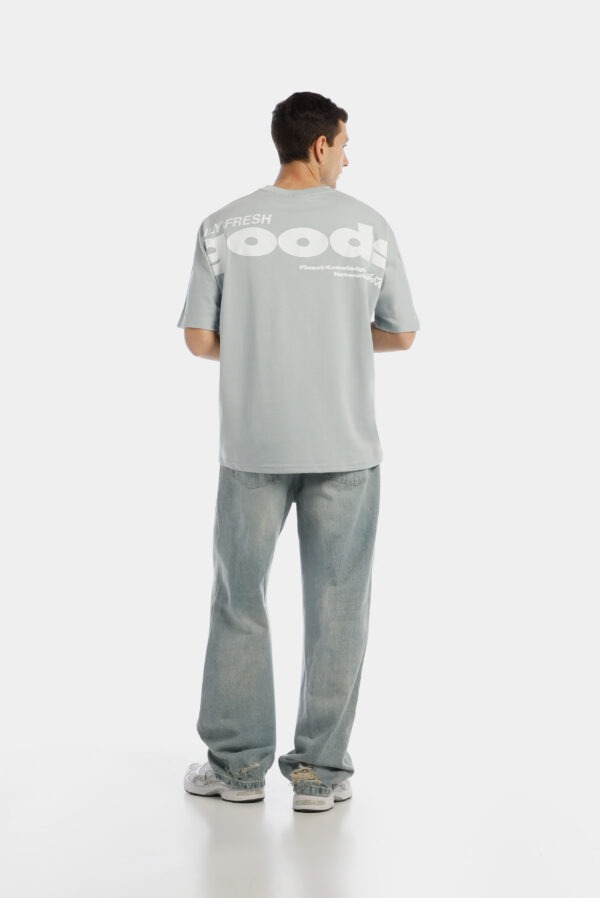 Camiseta overzise celeste texto