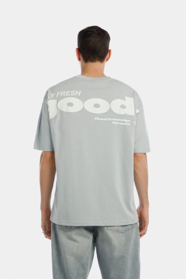 Camiseta overzise celeste texto